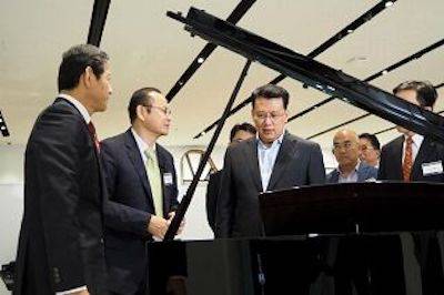 回顾发展历史，畅想科技未来|中国浙江省代表团视察QG刮刮乐企业博物馆