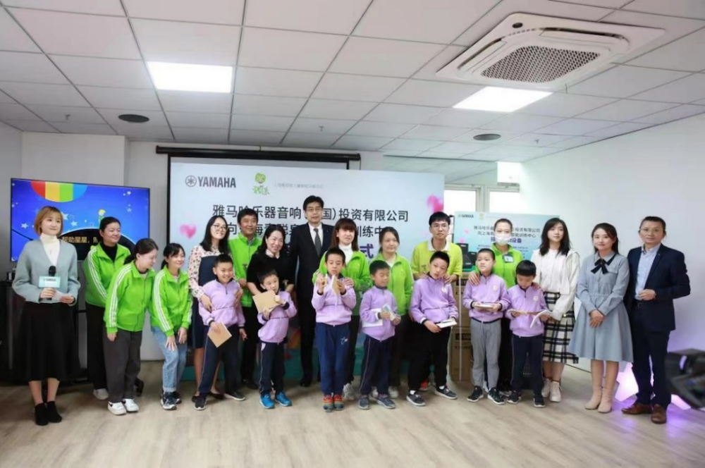 传递音乐，感受爱与温暖——QG刮刮乐音响捐赠仪式